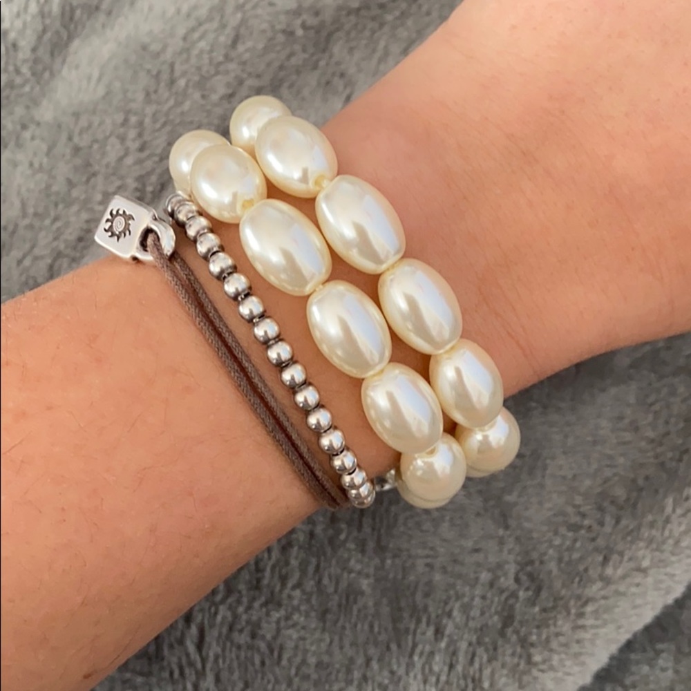 Two elongated pearl bracelets